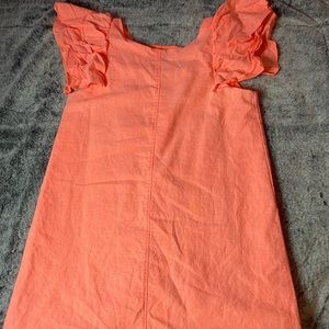 Pink dress with ruffle sleeves